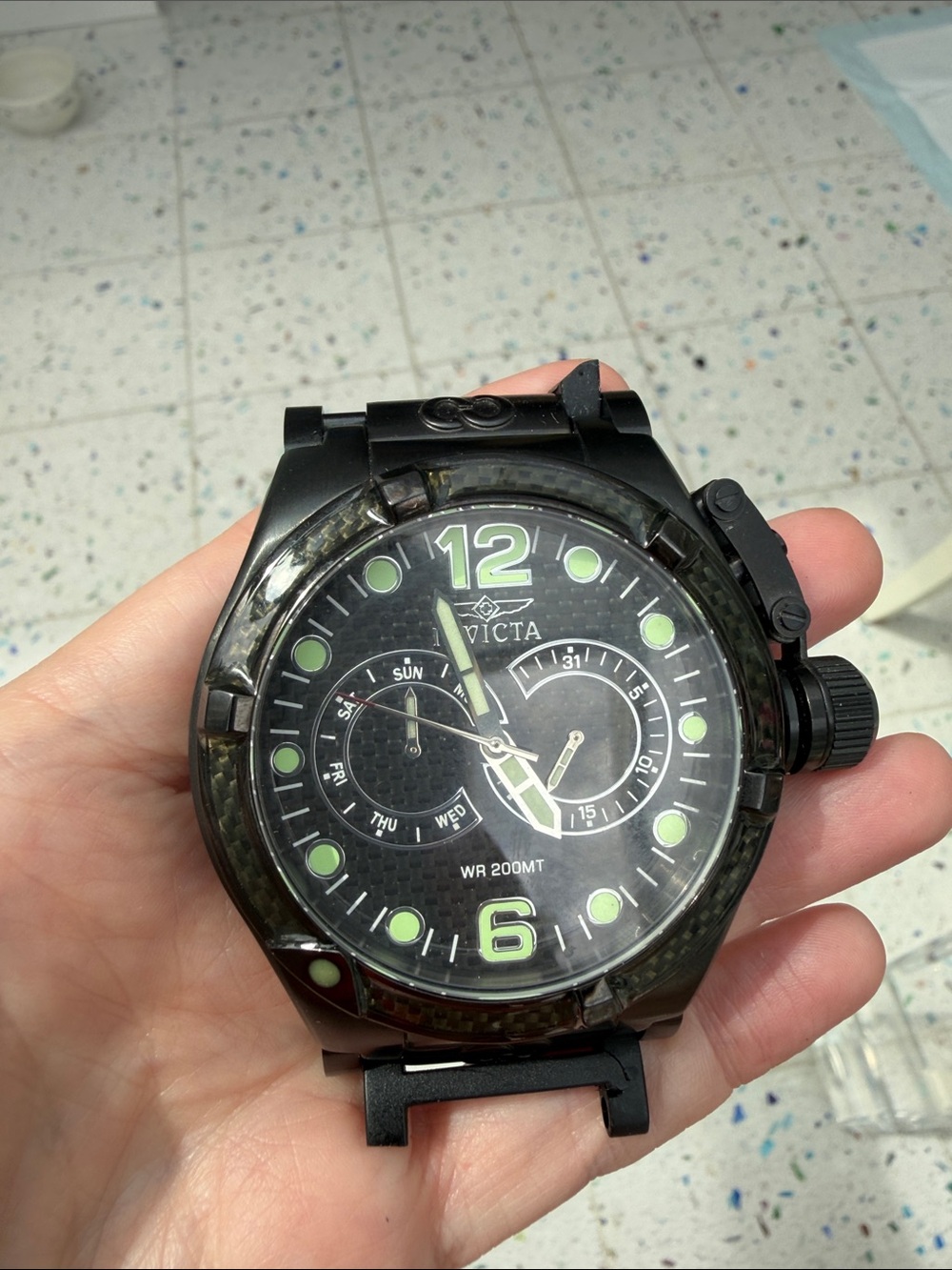 Invicta Black Watch with Green Accents